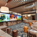 The feature media wall of the renovated Embassy Suites Monterey Bay Seaside hotel, redesigned by AXIS/GFA