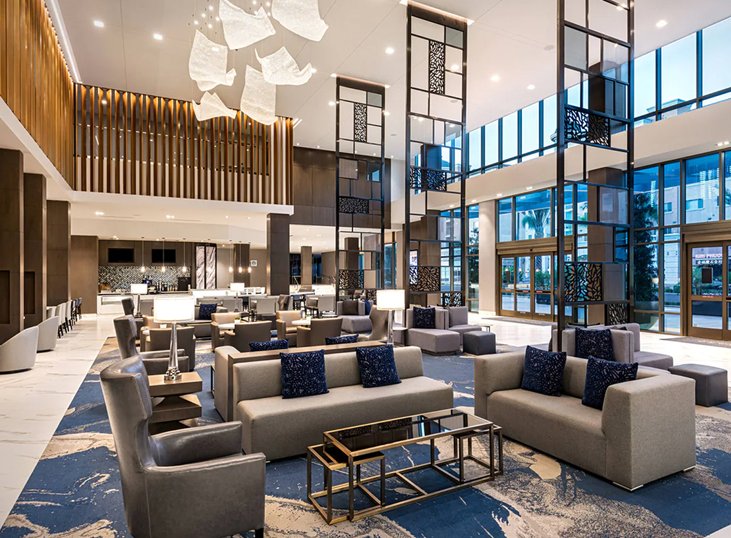 A view of the lobby of the award-winning Courtyard Los Angeles Monterey Park, a hotel designed by Los Angeles hotel designers AXIS